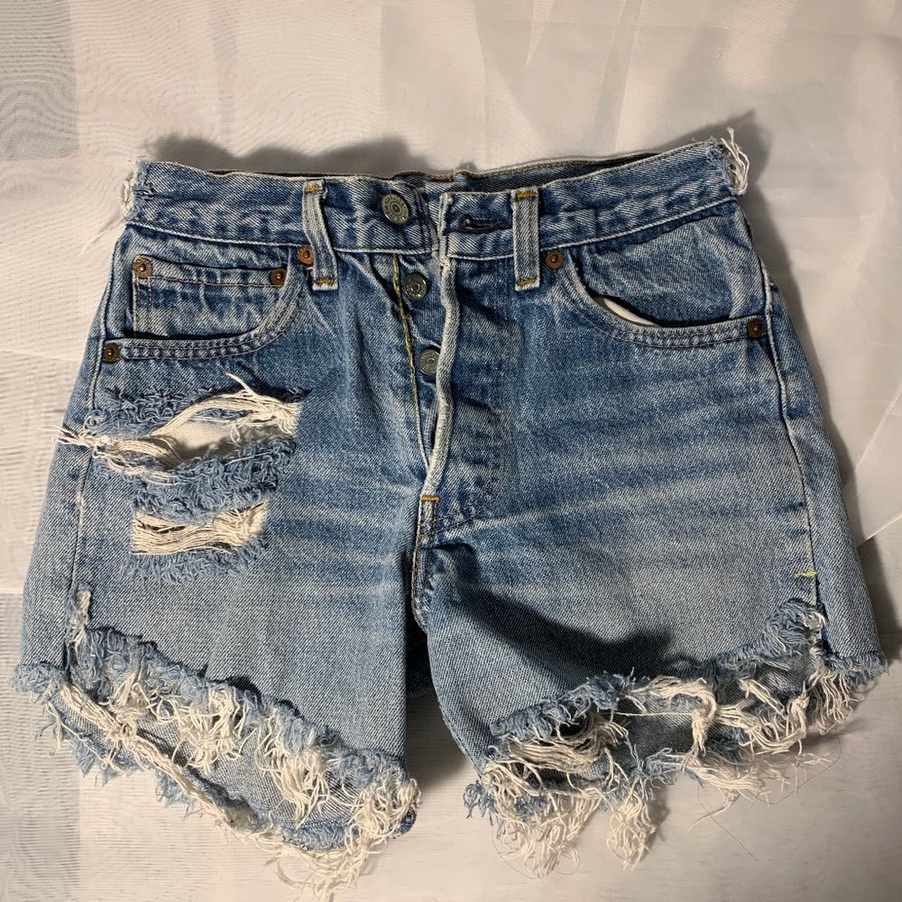 Levis high waisted destructed jean shorts.